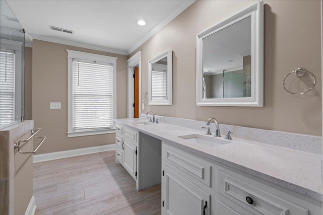 bathroom featuring vanity and ornamental molding