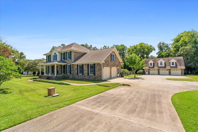 view of front of home featuring a garage and a front lawn