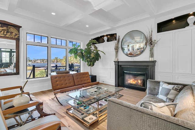 living room featuring light hardwood / wood-style flooring, beam ceiling, and coffered ceiling