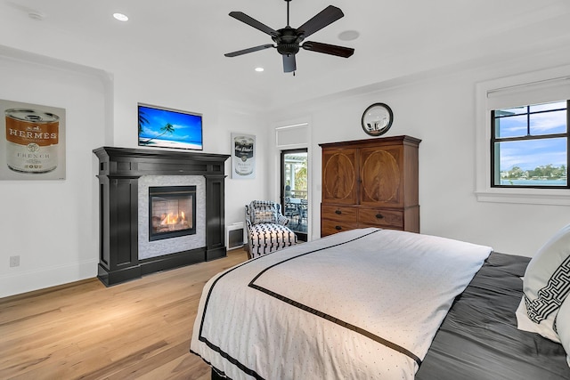 bedroom featuring ceiling fan and wood-type flooring