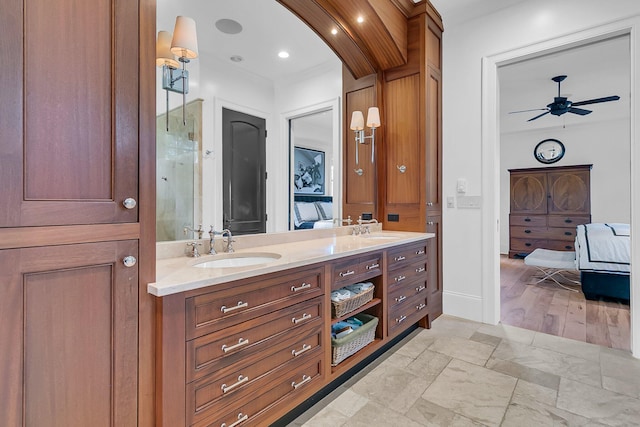 bathroom featuring vanity, ceiling fan, hardwood / wood-style flooring, and a shower with door