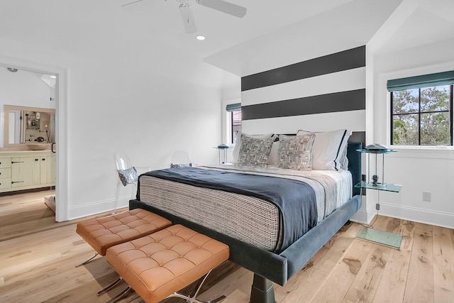 bedroom featuring ceiling fan and light hardwood / wood-style flooring