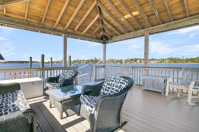 wooden deck featuring a water view