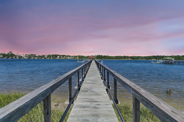 view of dock with a water view