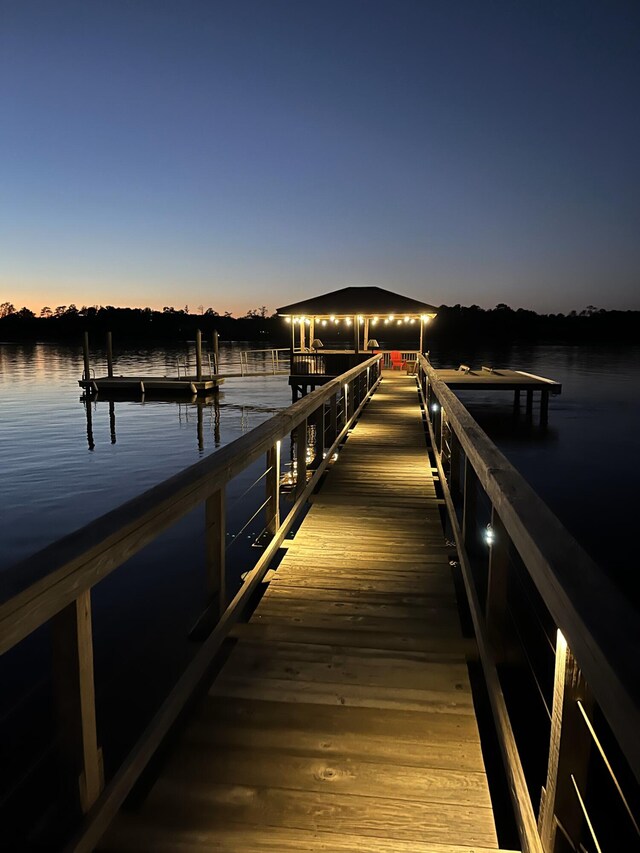 view of dock with a water view