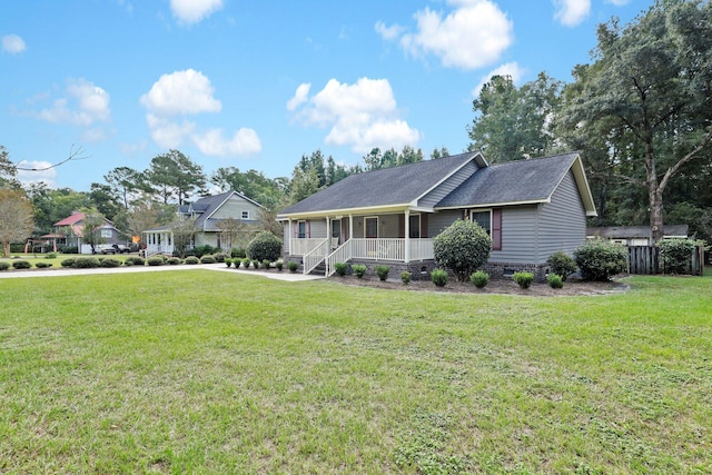 view of front facade featuring a front yard and a porch