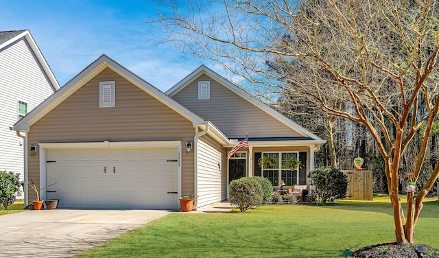 view of front of home with a garage, driveway, and a front yard