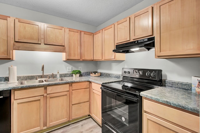 kitchen with black appliances, sink, a textured ceiling, light hardwood / wood-style floors, and light brown cabinets