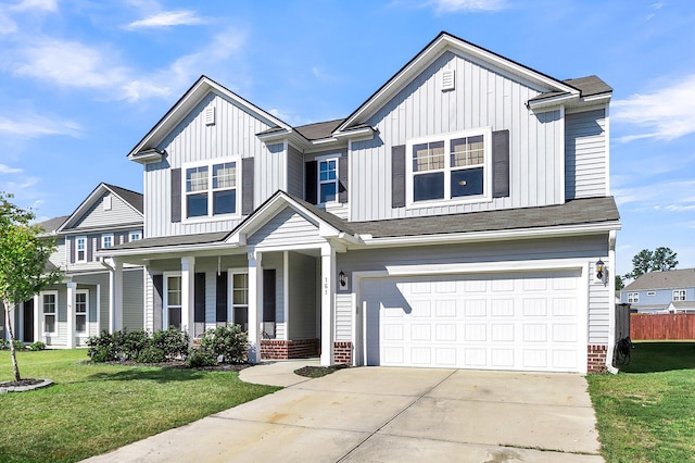 view of front of house featuring a garage and a front yard