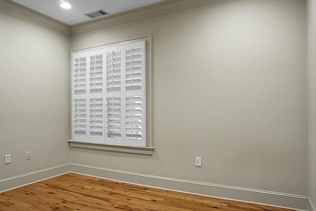 4252 Faber Place Dr Unit 203, North Charleston, SC 29405 - empty room featuring ornamental molding, wood finished floors, baseboards, and recessed lighting