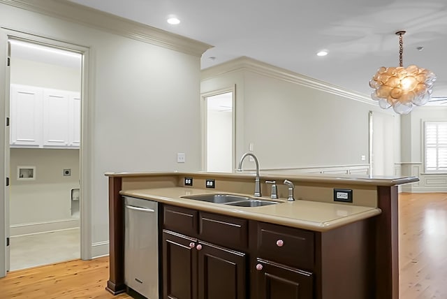 4252 Faber Place Dr Unit 203, North Charleston, SC 29405 - kitchen featuring a sink, crown molding, light wood-style floors, dark brown cabinetry, and light countertops