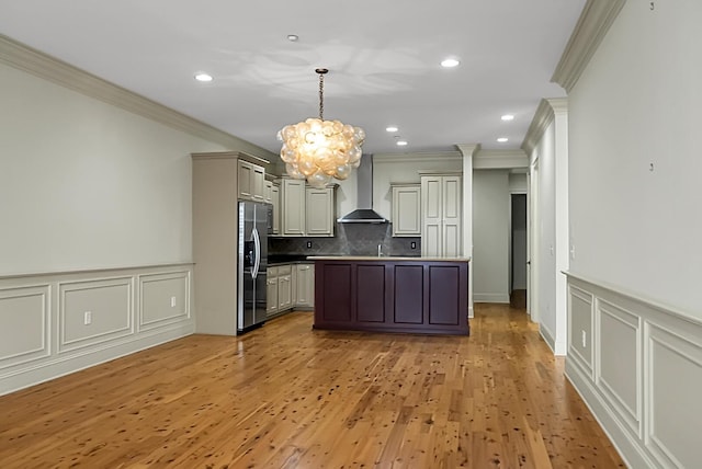 4252 Faber Place Dr Unit 203, North Charleston, SC 29405 - kitchen with stainless steel refrigerator with ice dispenser, wall chimney range hood, a chandelier, ornamental molding, and backsplash