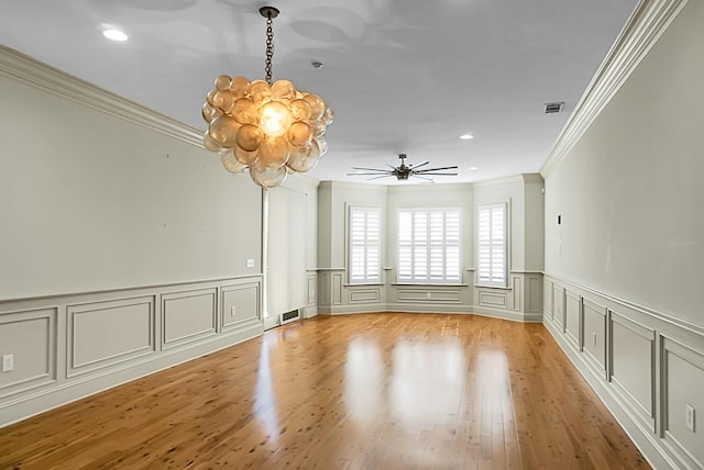 4252 Faber Place Dr Unit 203, North Charleston, SC 29405 - empty room featuring ornamental molding, a decorative wall, a chandelier, a ceiling fan, and recessed lighting