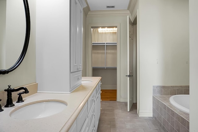 4252 Faber Place Dr Unit 203, North Charleston, SC 29405 - full bath with a garden tub, double vanity, a closet, ornamental molding, and baseboards