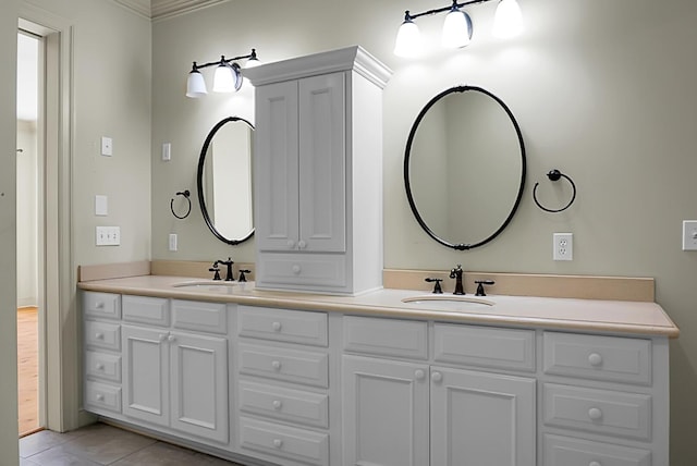 4252 Faber Place Dr Unit 203, North Charleston, SC 29405 - bathroom featuring double vanity, ornamental molding, and tile patterned flooring