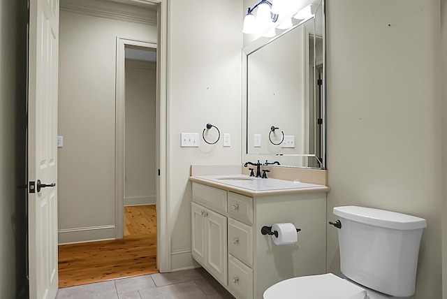 4252 Faber Place Dr Unit 203, North Charleston, SC 29405 - bathroom featuring vanity, toilet, tile patterned floors, and baseboards
