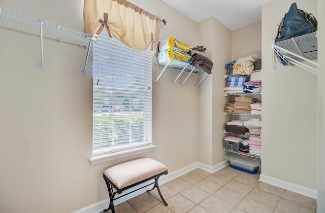 spacious closet featuring tile patterned floors