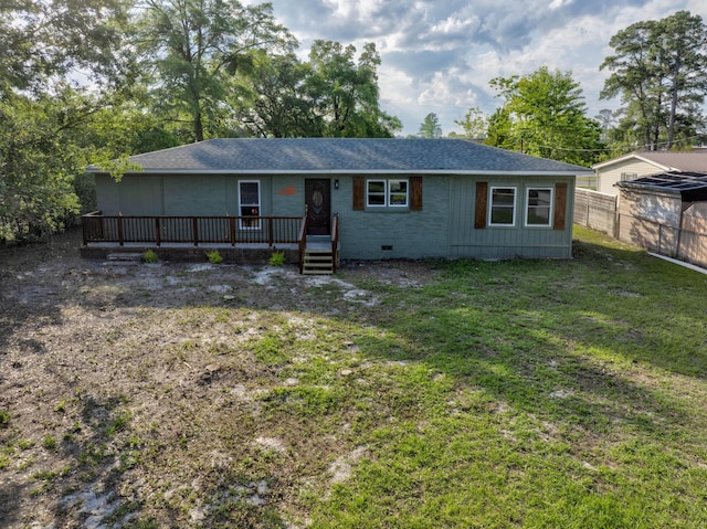 121 Harrison St, Varnville, SC 29944 - ranch-style home featuring a deck, crawl space, and roof with shingles