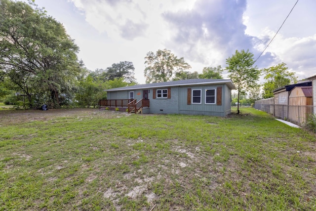 121 Harrison St, Varnville, SC 29944 - back of property with a deck