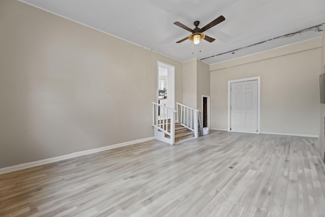 121 Harrison St, Varnville, SC 29944 - empty room featuring ceiling fan, light wood finished floors, and baseboards