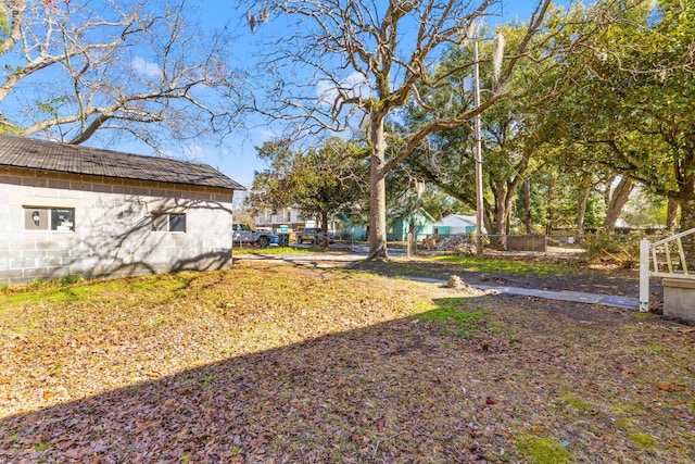 view of yard featuring fence