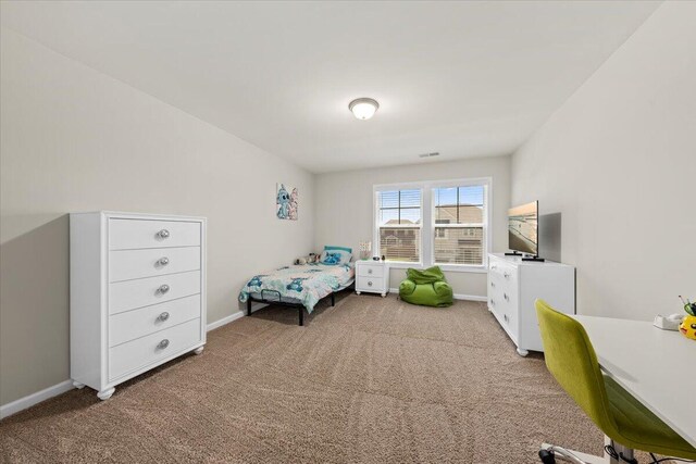 3055 Matthews Dr, Sumter, SC 29154 - carpeted bedroom with baseboards