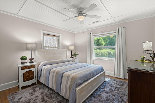 672 W Oak Forest Dr, Charleston, SC 29407 - bedroom with wood finished floors, baseboards, ceiling fan, ornamental molding, and attic access
