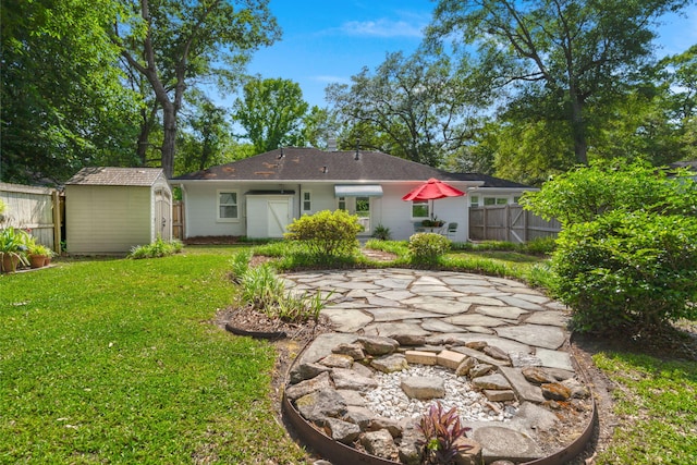 672 W Oak Forest Dr, Charleston, SC 29407 - rear view of property with a storage shed and an outbuilding
