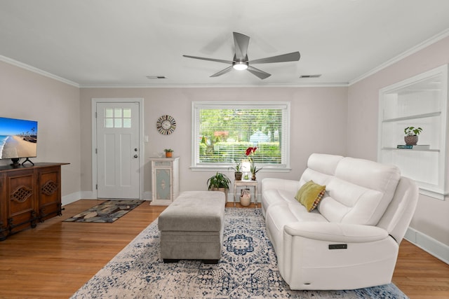 672 W Oak Forest Dr, Charleston, SC 29407 - living area featuring wood finished floors, ornamental molding, a ceiling fan, and baseboards