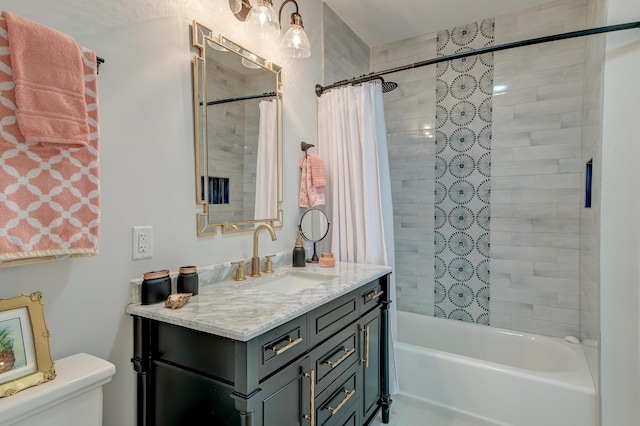 bathroom with vanity, toilet, and shower / tub combo