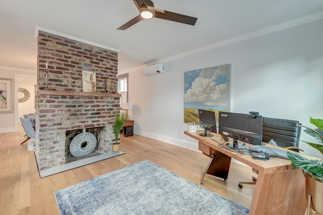 office area featuring baseboards, ornamental molding, ceiling fan, and a wall mounted air conditioner