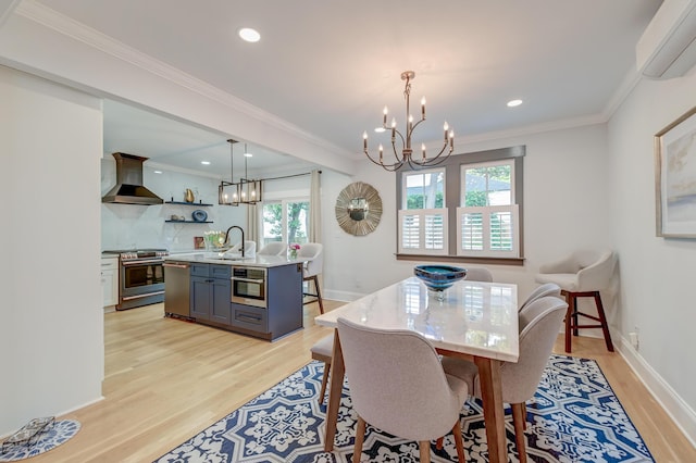 dining space featuring crown molding, an AC wall unit, recessed lighting, a chandelier, and light wood finished floors