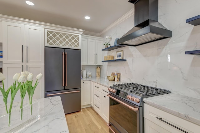 kitchen featuring exhaust hood, appliances with stainless steel finishes, open shelves, ornamental molding, and white cabinetry