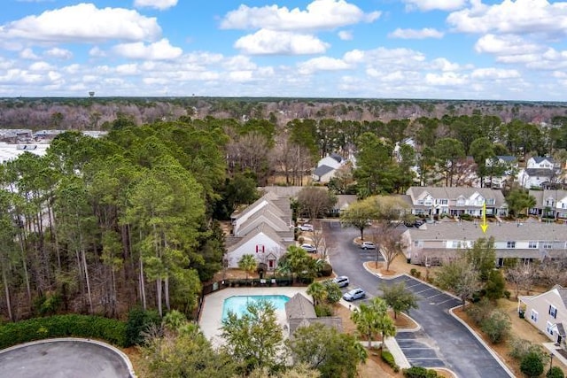 birds eye view of property with a residential view