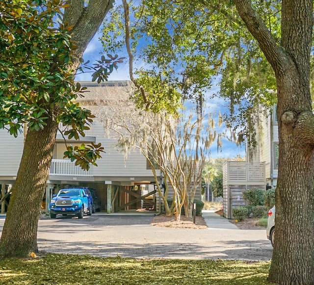 exterior space featuring a carport