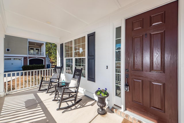 doorway to property with covered porch