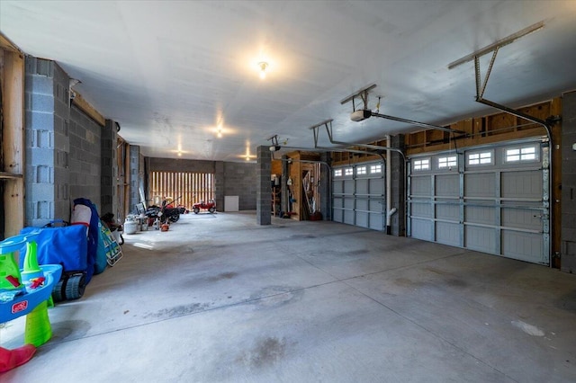 garage featuring a garage door opener