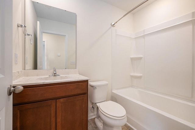 bathroom with toilet, vanity, and washtub / shower combination