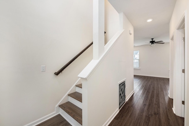 staircase with a ceiling fan, wood finished floors, baseboards, and recessed lighting