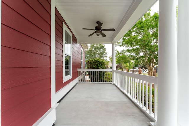 balcony featuring a porch and ceiling fan
