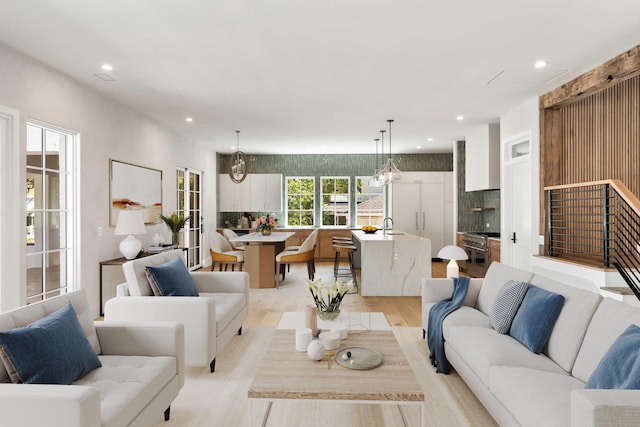 living room featuring recessed lighting and light wood finished floors
