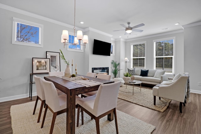 123 Brown Swiss Cir, Summerville, SC 29483 - dining room featuring baseboards, recessed lighting, wood finished floors, and ceiling fan with notable chandelier