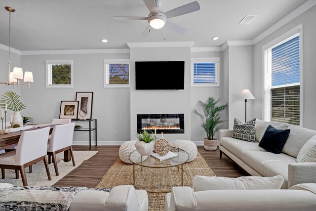 123 Brown Swiss Cir, Summerville, SC 29483 - living room with plenty of natural light, visible vents, crown molding, and wood finished floors