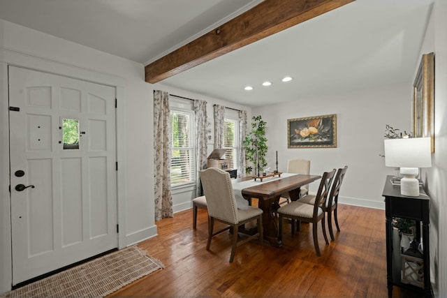 dining room with beamed ceiling, hardwood / wood-style flooring, baseboards, and recessed lighting