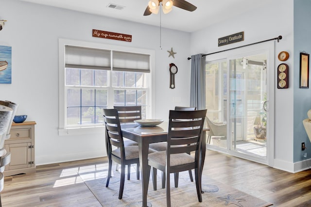 3473 Plow Ground Rd, Johns Island, SC 29455 - dining room with light wood-type flooring, a ceiling fan, and baseboards