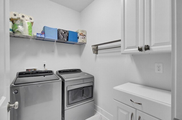 3473 Plow Ground Rd, Johns Island, SC 29455 - laundry area with separate washer and dryer, cabinet space, and baseboards