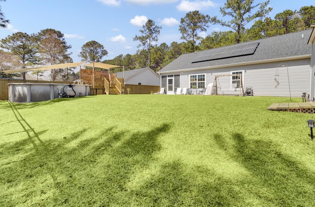 3473 Plow Ground Rd, Johns Island, SC 29455 - view of grassy yard featuring an outdoor pool, a playground, and a deck