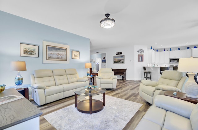 3473 Plow Ground Rd, Johns Island, SC 29455 - living room featuring light wood-style flooring and baseboards