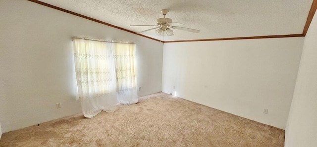 spare room with ornamental molding, a textured ceiling, light colored carpet, ceiling fan, and lofted ceiling