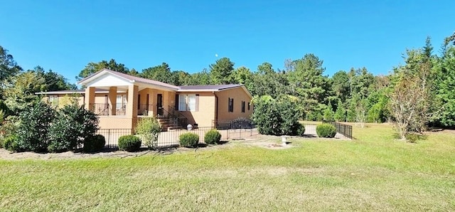 exterior space with a yard and covered porch